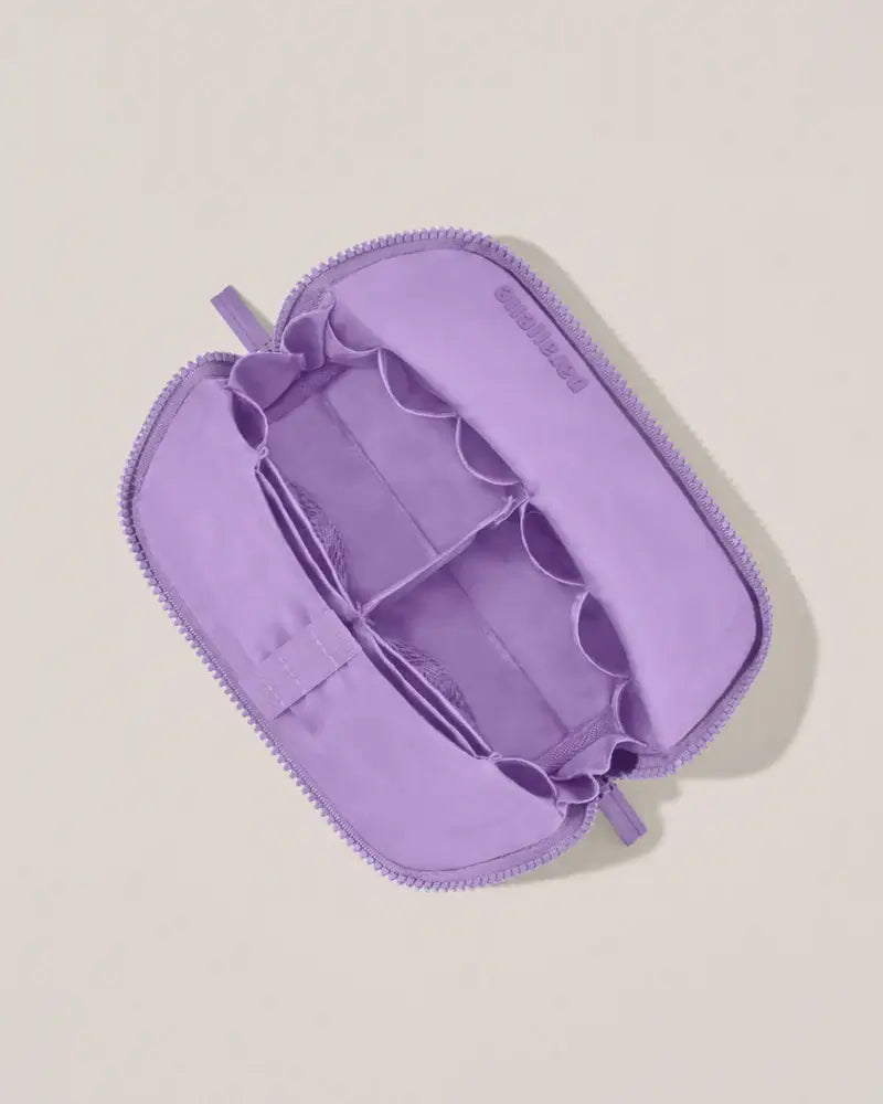 THE SMALL LILAC TRAVELLER