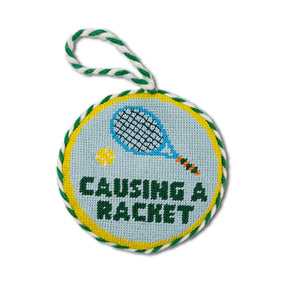 CAUSING A RACKET NEEDLEPOINT ORNAMENT