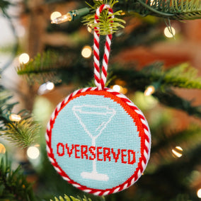 OVERSERVED NEEDLEPOINT ORNAMENT