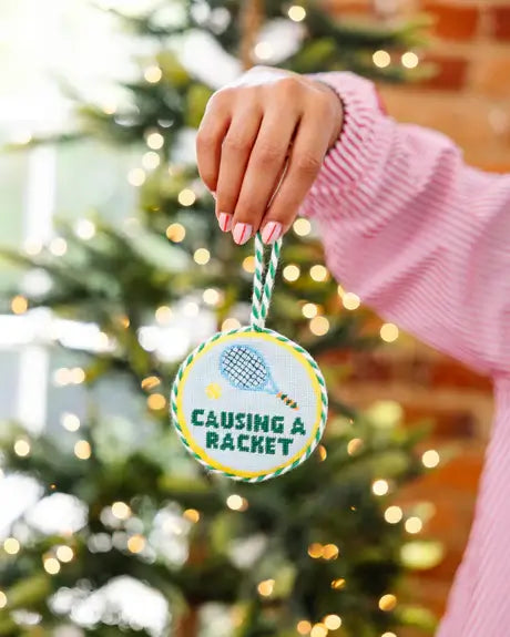 CAUSING A RACKET NEEDLEPOINT ORNAMENT