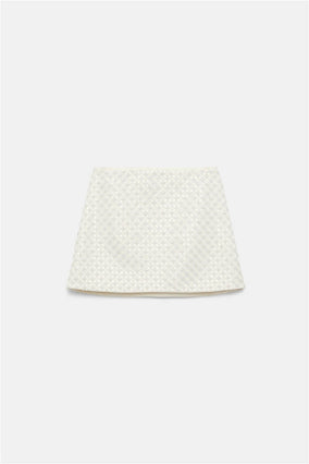 SPARKLING STATEMENT PEARL MINI SKIRT