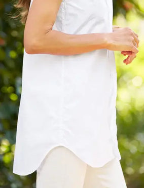 SLEEVELESS LAYERING BUTTON UP IN WHITE
